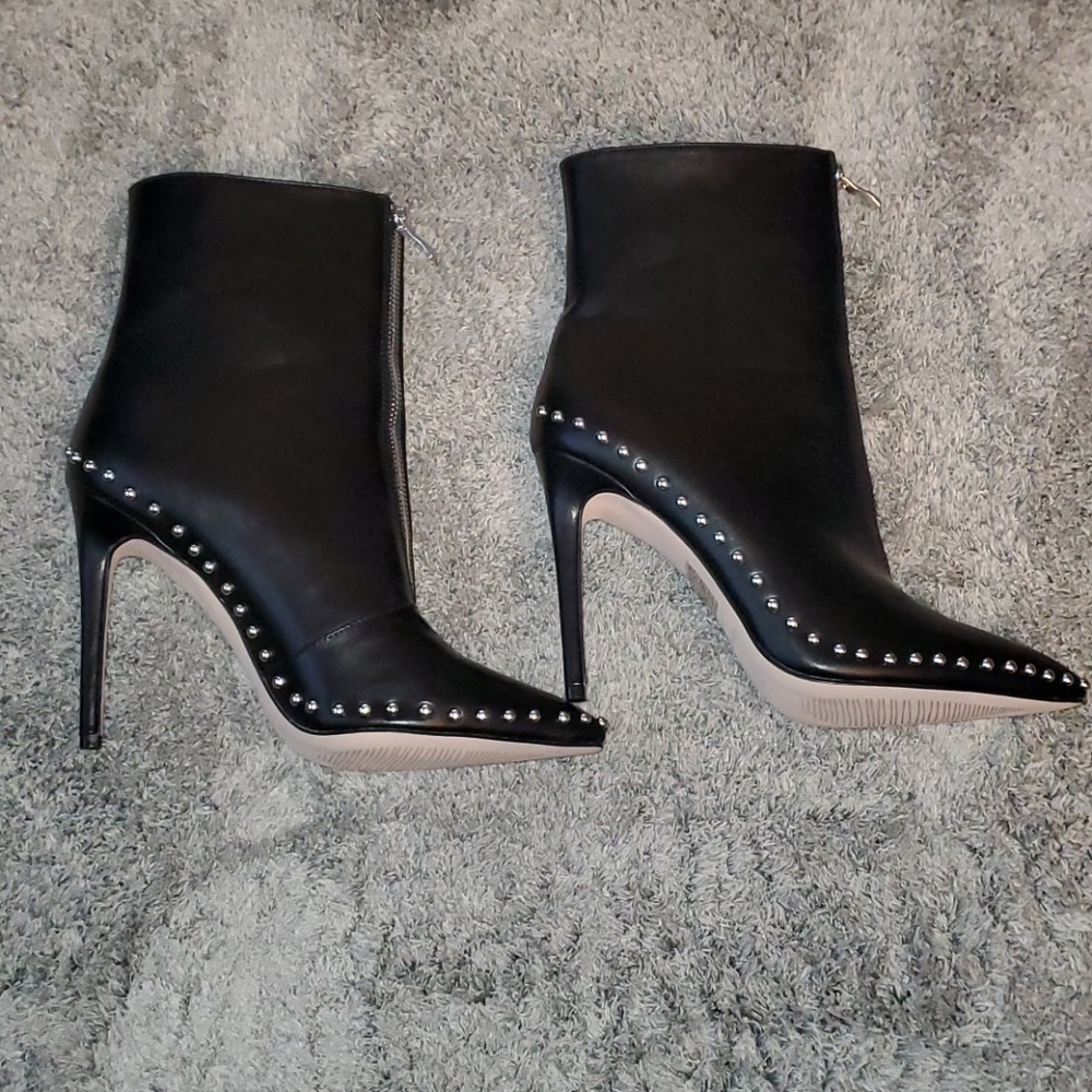 Black Stiletto Boots and Mossino Pumps